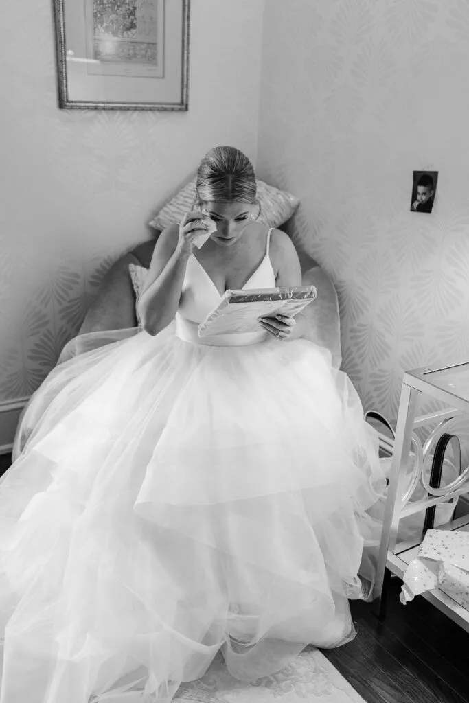 Bride reading note from husband