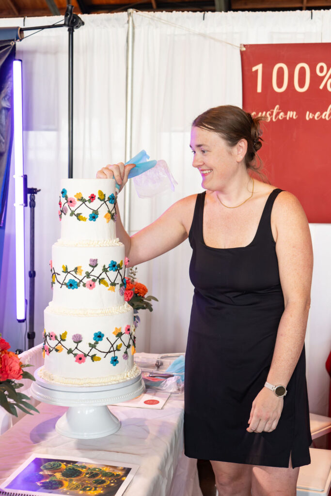 Baker icing a cake