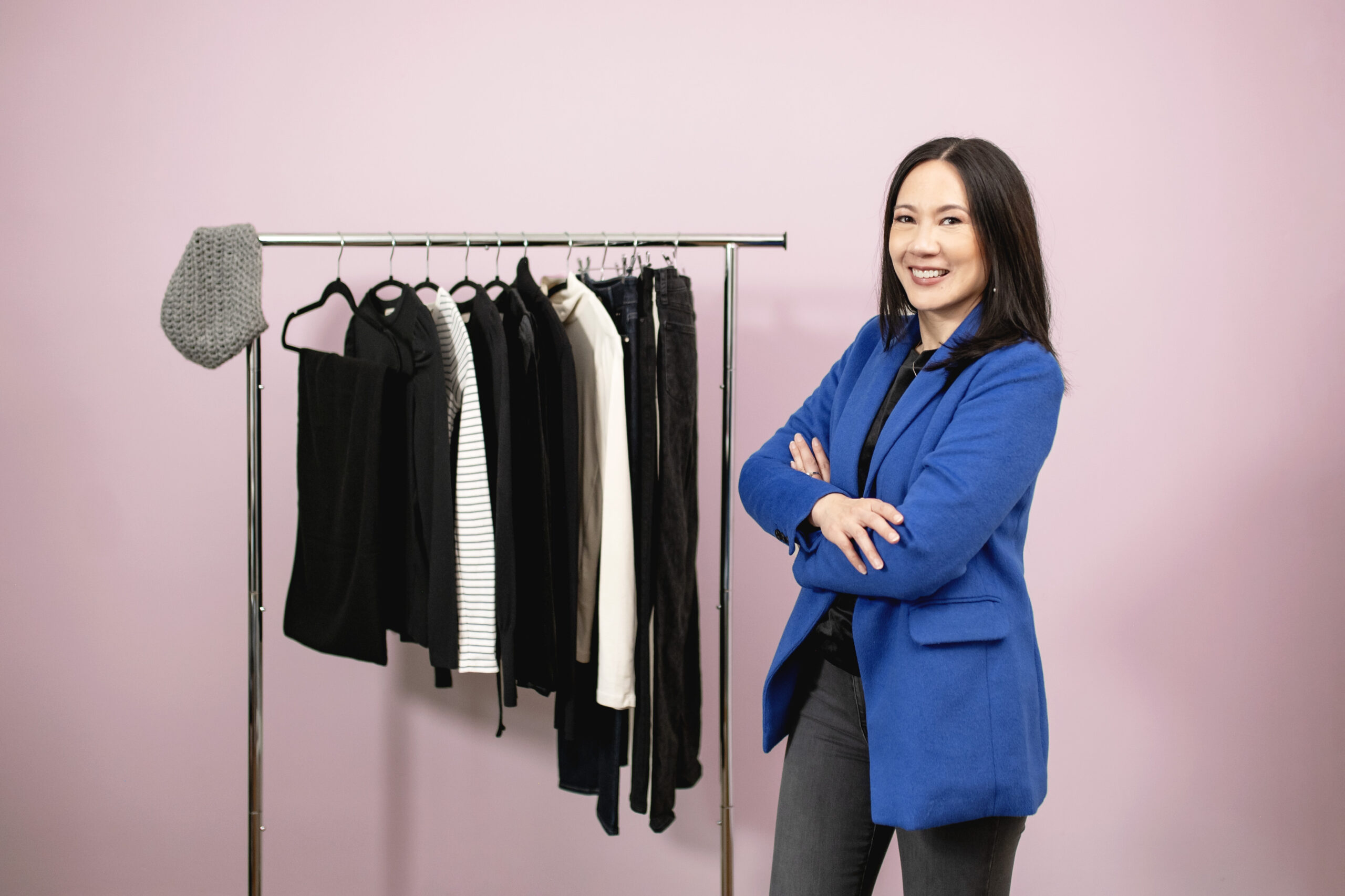 Neutral capsule wardrobe example with pop of color
