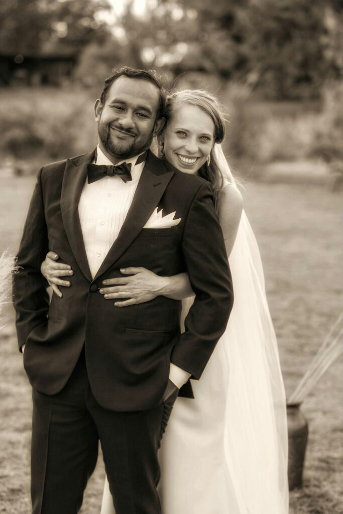 bride embracing groom