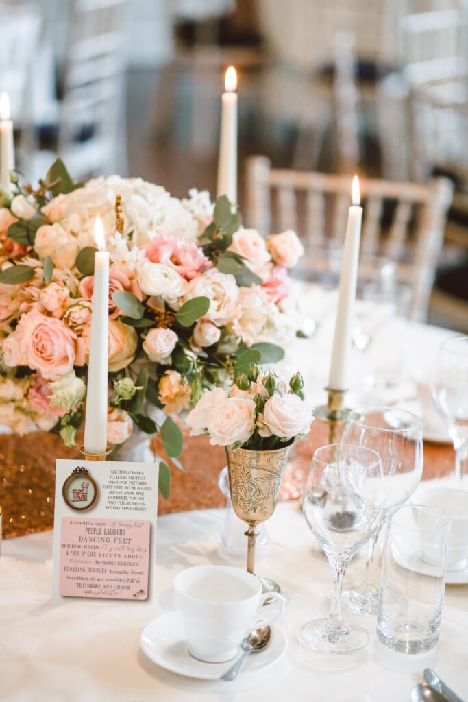 wedding reception table with china and wine glasses