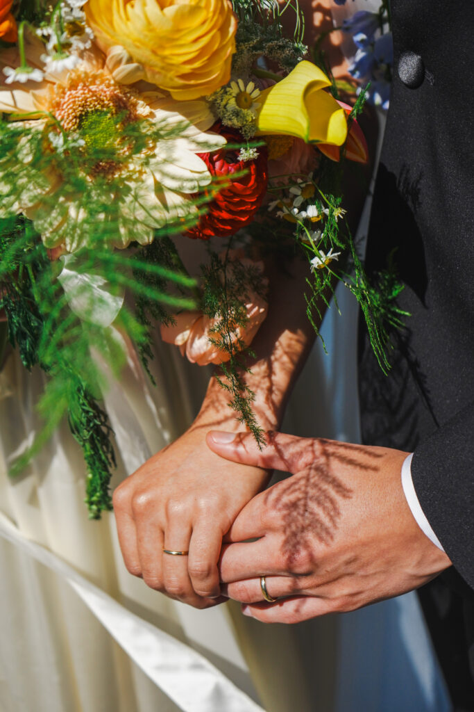 wedding couple holding hands
