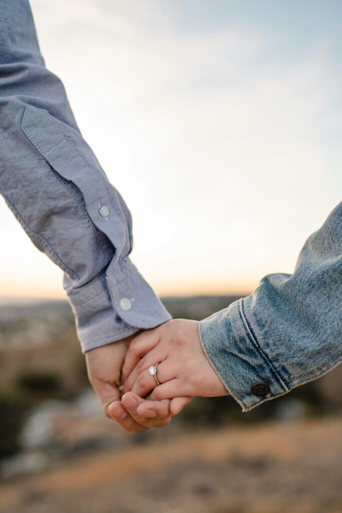 Couple holding hands