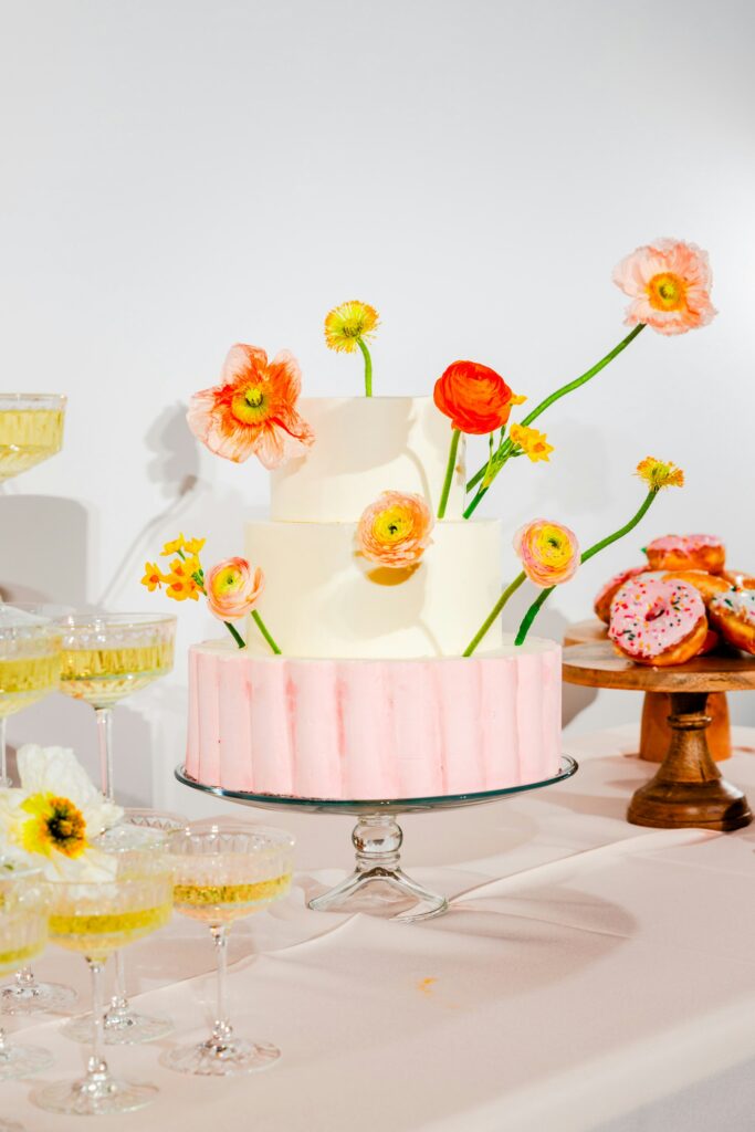 Colorful wedding cake with flowers 