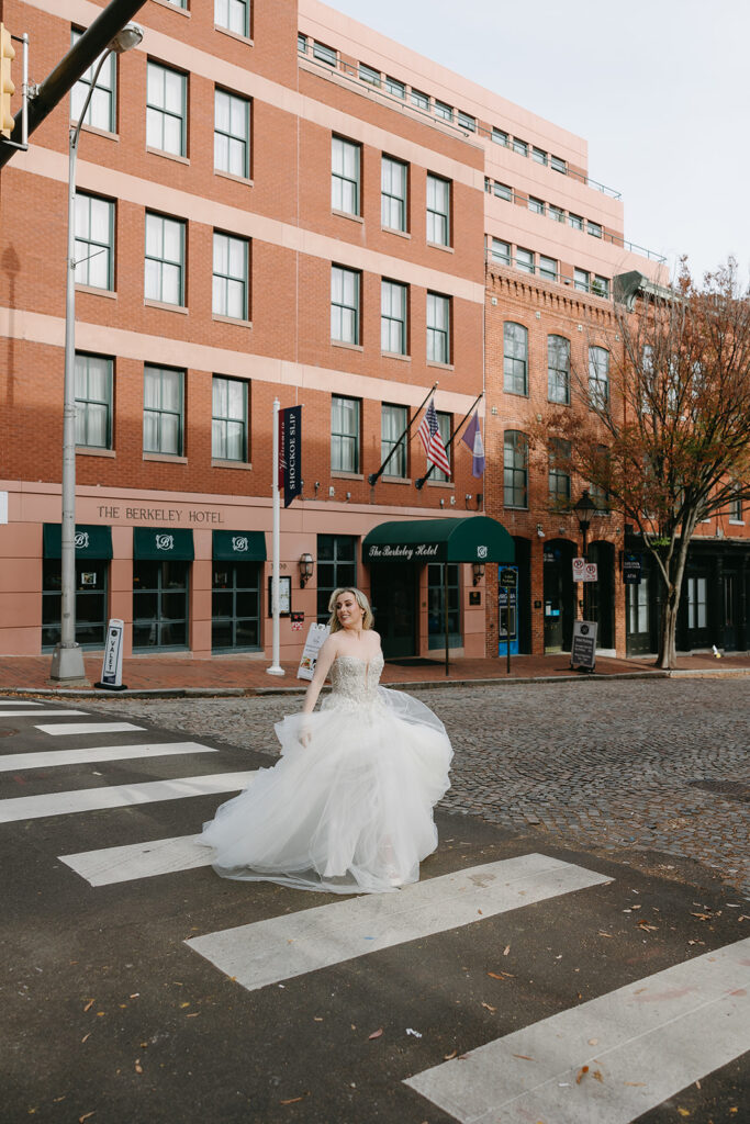 Bride running through city