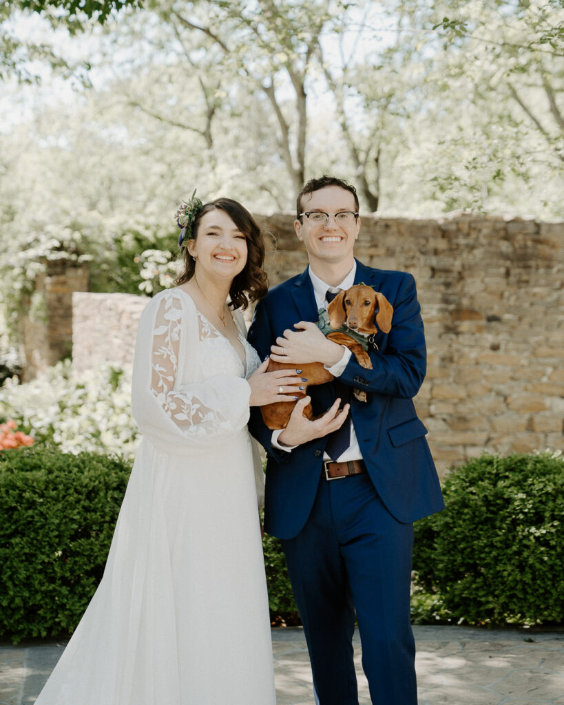 Bride and groom with dog