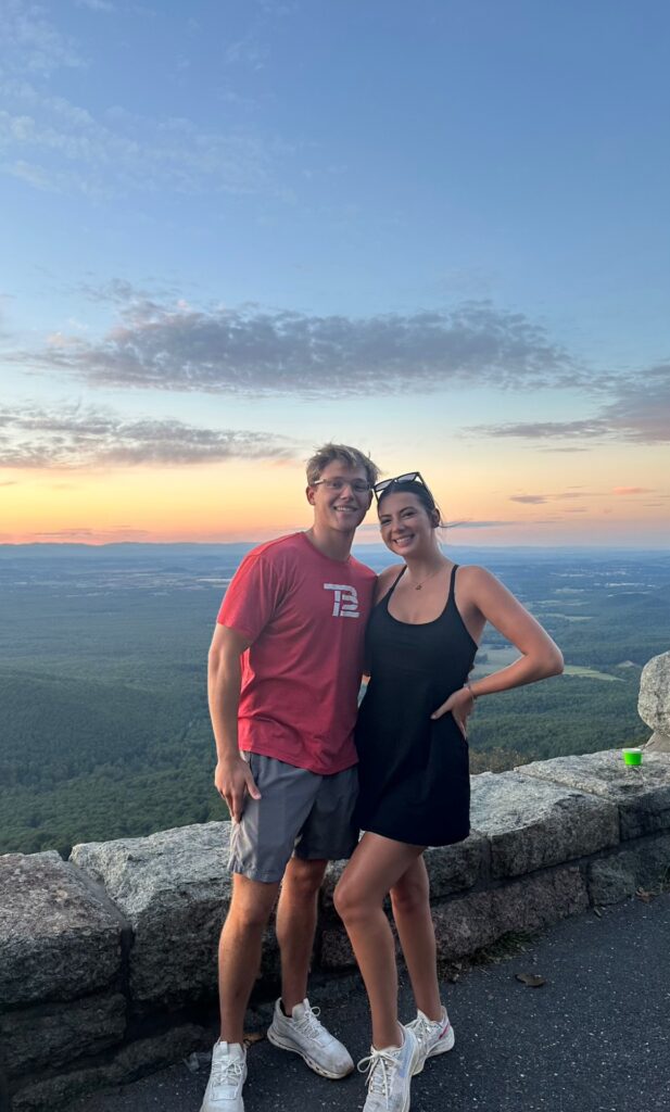 Couple at overlook during sunset