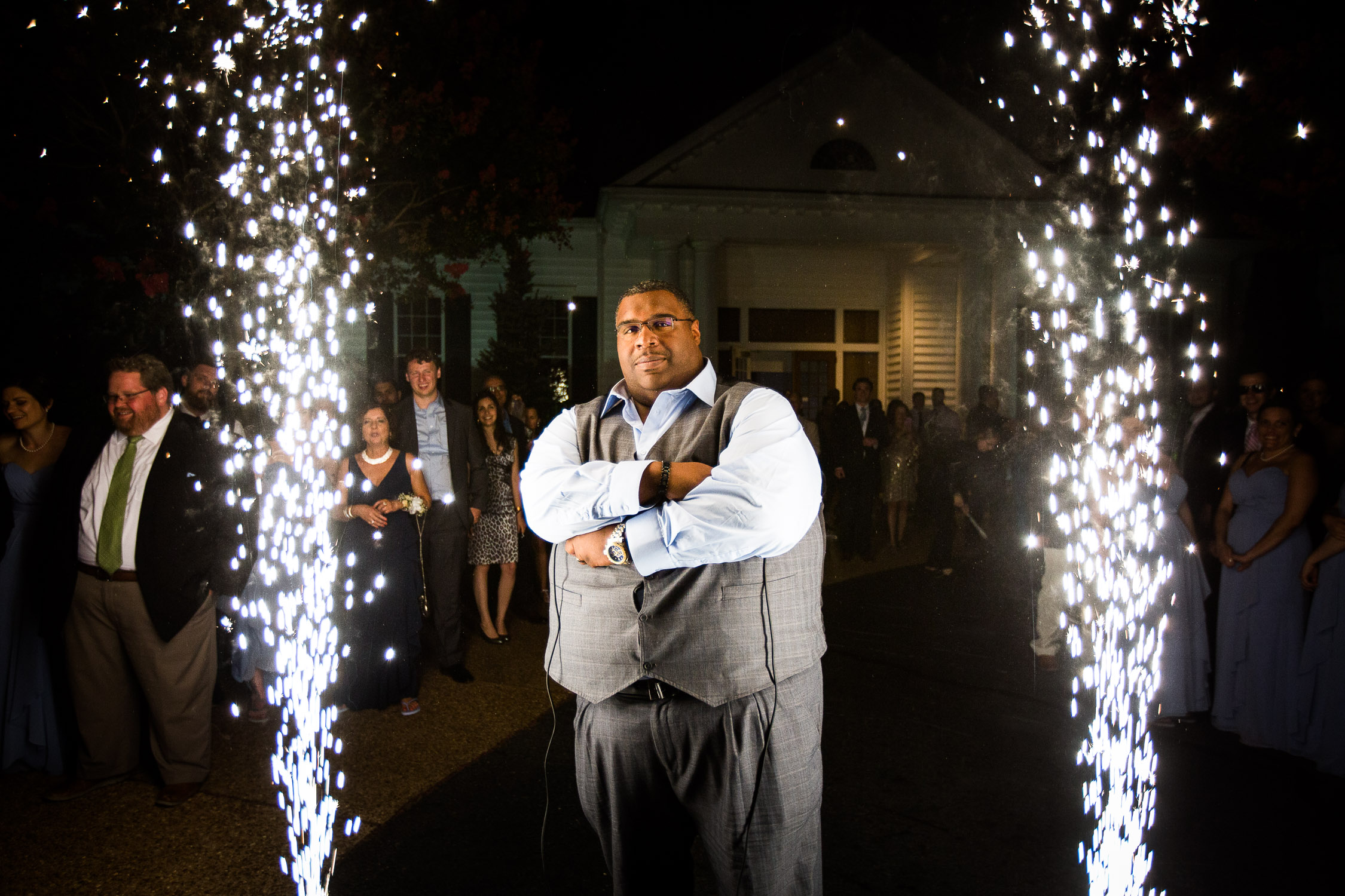 Rebekah & Sami’s Wedding DJ standing in between cold sparks
