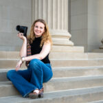 Photographer on steps with camera
