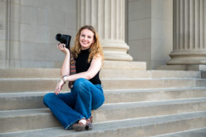 Photographer on steps with camera