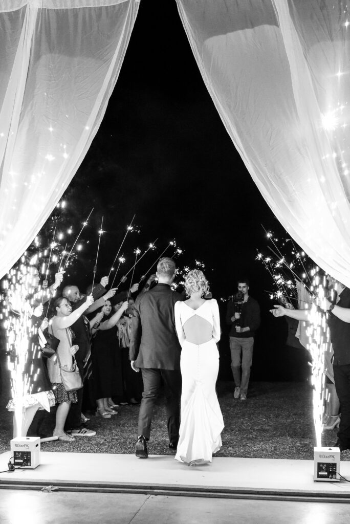 Bride and grooms gran exit with cold sparks