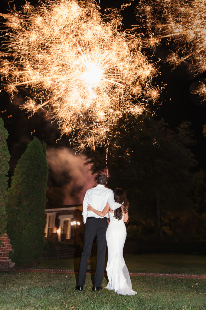 Bride and gtoom with fireworks show