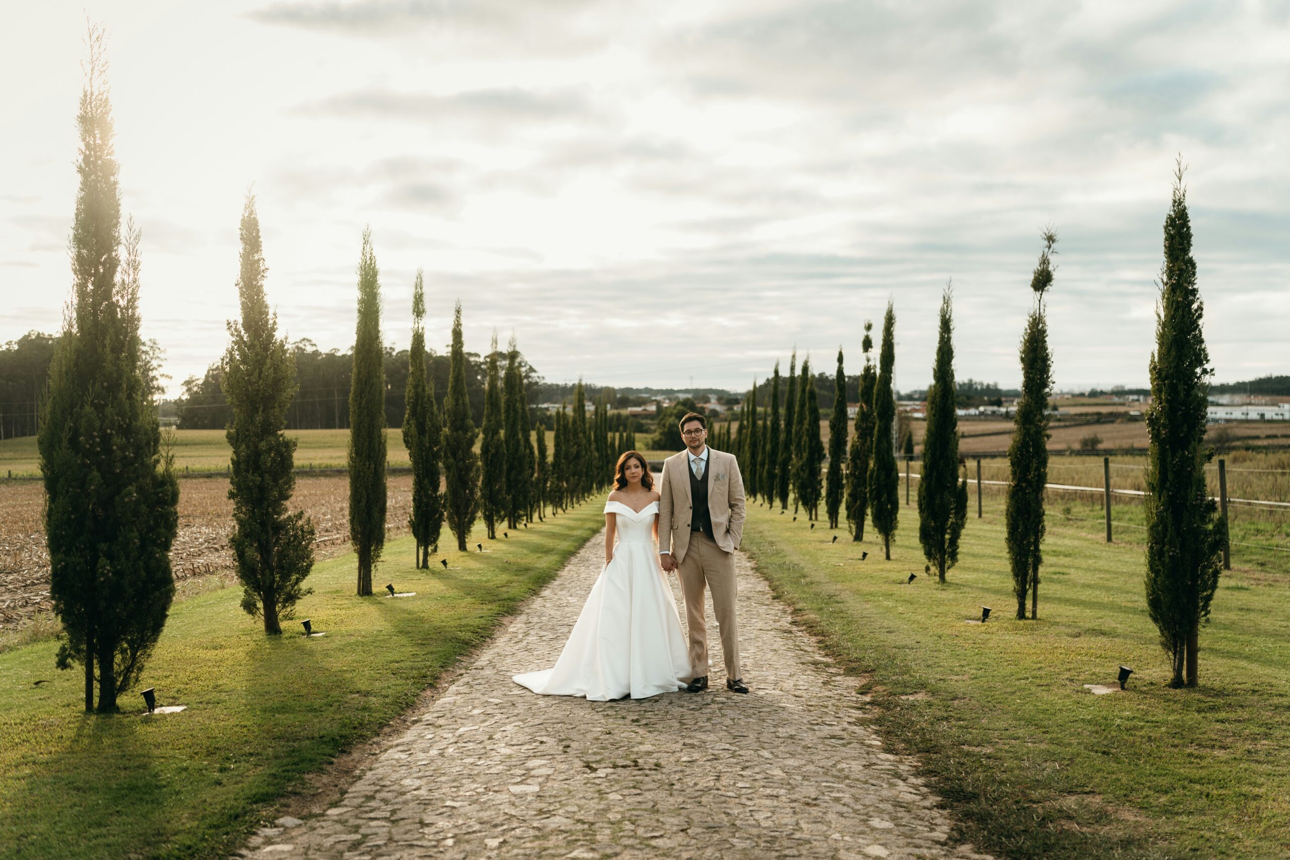 Couple on wedding da standing in road