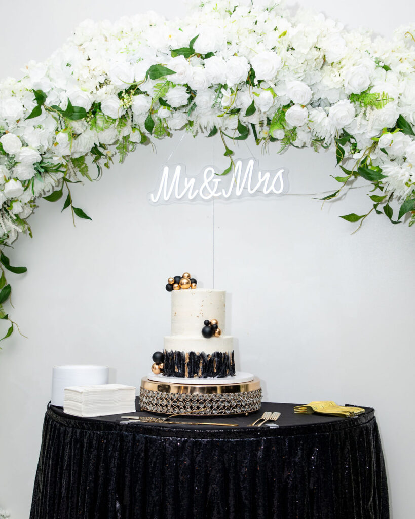 Wedding cake with floral arch