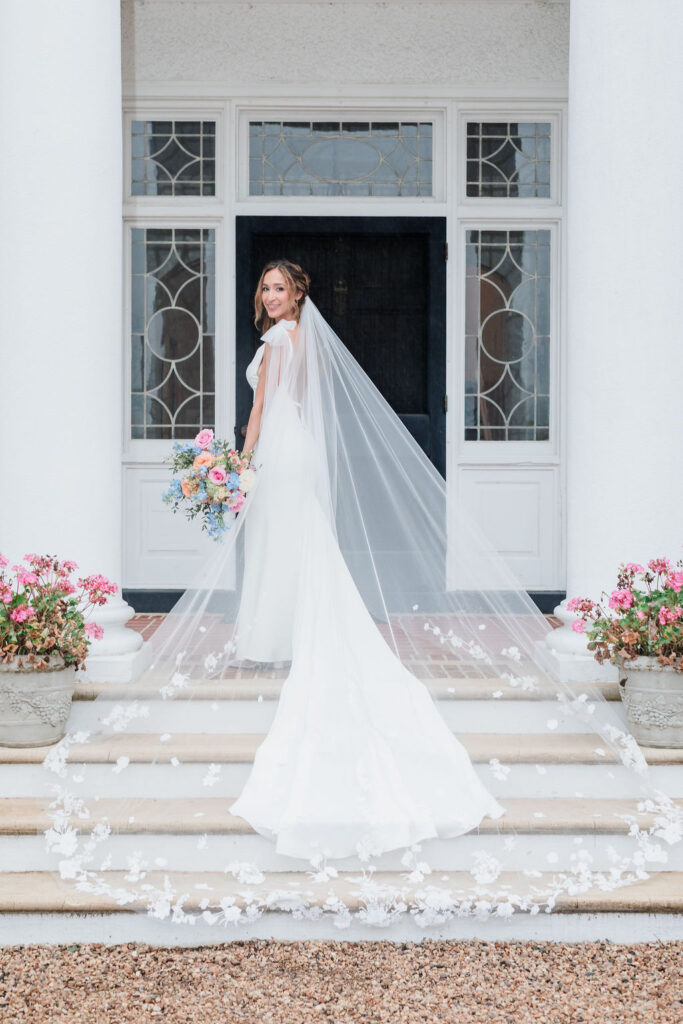 Bride standing on staircase
