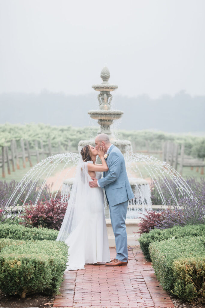 Bride and groom kissing