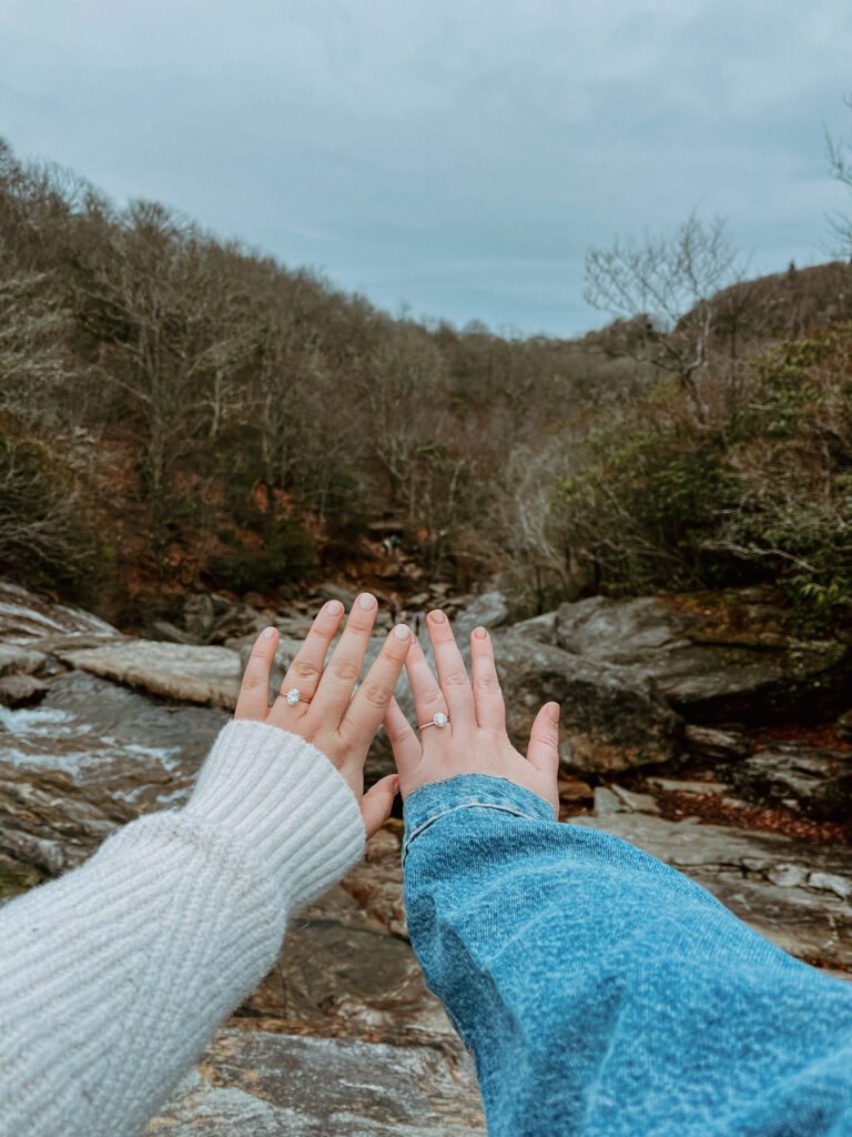 Hands with engagement rings