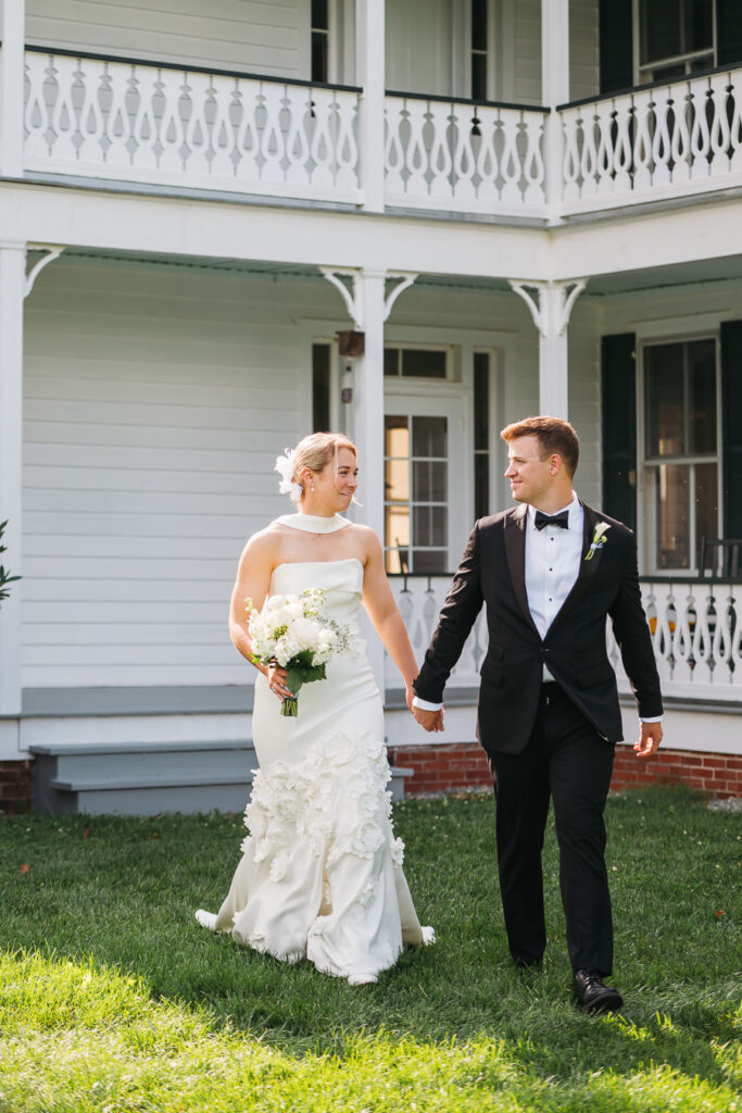 Married couple walking while looking at eachother