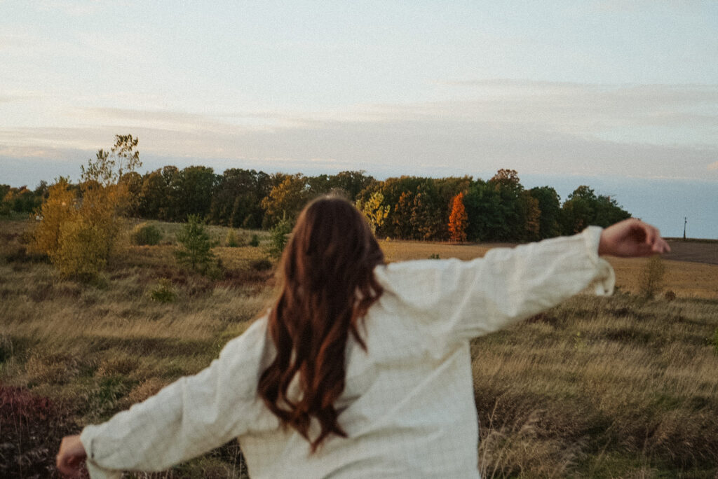 Woman running in field
